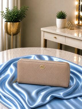 Gucci  Leather Zip Around Wallet.